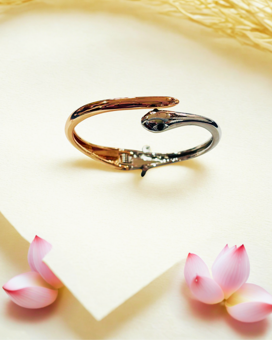 Serpent Glow Cuff(elegant bracelet with a snake-inspired)