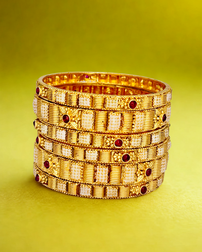 Traditional Gold Bangles with Ruby Accents